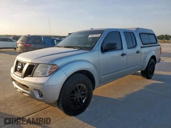 2015 Nissan Frontier SV z VIN 1N6AD0FV4FN762929, wystawiony jako Copart lot #65521915 z przebiegiem 197 641 mil mil oraz Czysty tytuł • Clean title. Historia ofert i sprzedaży dostępna na DreamBid. Obrazek 1.