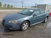 ✅ 2007 Pontiac Grand Prix • VIN: 2G2WP552871153998 • Lot: 43129081. Listed on IAAI with 5,825 mi. Free auction sales archive from the USA and detailed vehicle history report at DreamBid. Image 2.