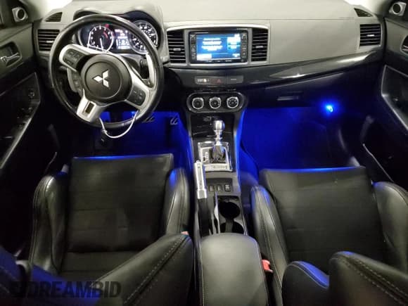 ✅ 2014 Mitsubishi Lancer Evolution MR • VIN: JA32W5FV8EU001662 • Lot: 65890605. Listed on Copart with 65,257 mi. Free auction sales archive from the USA and detailed vehicle history report at DreamBid. Image 8.