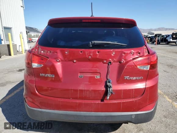 2012 Hyundai Tucson GL z VIN KM8JT3ABXCU340701, wystawiony jako Copart lot #85144885 z przebiegiem 147 376 mil mil oraz Szkoda całkowita • Salvage title. Historia ofert i sprzedaży dostępna na DreamBid. Obrazek 6.