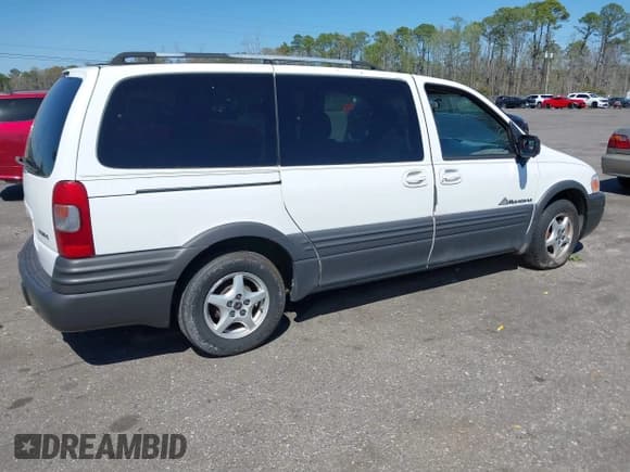 ✅ 2001 Pontiac Montana • VIN: 1GMDX03EX1D250999 • Lot: 41775181. Wystawiony na IAAI z przebiegiem 151 336 mil. Bezpłatny archiwum sprzedaży aukcyjnych z USA i szczegółowy raport historii pojazdu na DreamBid. Zdjęcie 4.