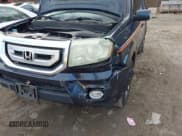 ✅ 2011 Honda Pilot Touring • VIN: 5FNYF4H91BB058733 • Lot: 43765223. Listed on IAAI with 219,502 mi. Free auction sales archive from the USA and detailed vehicle history report at DreamBid. Image 12.