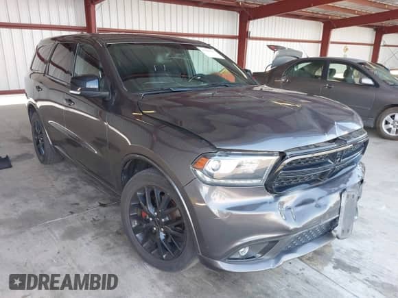 2015 Dodge Durango R/T z VIN 1C4SDHCT8FC759925, wystawiony jako IAAI lot #43089087 z przebiegiem 196 142 mil mil oraz . Historia ofert i sprzedaży dostępna na DreamBid. Obrazek 1.