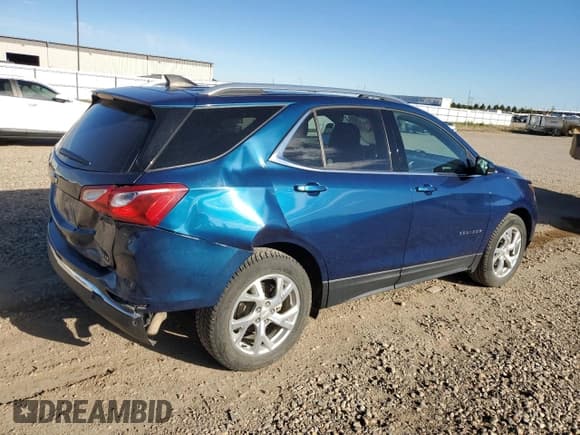 ✅ 2020 Chevrolet Equinox LT • VIN: 2GNAXUEV8L6203359 • Lot: 82624715. Listed on Copart with 79,825 mi. Free auction sales archive from the USA and detailed vehicle history report at DreamBid. Image 3.