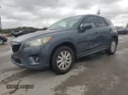 ✅ 2013 Mazda CX-5 Touring • VIN: JM3KE4CE4D0156841 • Lot: 90850755. Listed on Copart with 170,403 mi. Free auction sales archive from the USA and detailed vehicle history report at DreamBid. Image 1.