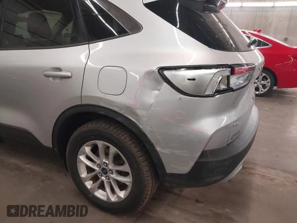 ✅ 2020 Ford Escape SE • VIN: 1FMCU9G63LUA56720 • Lot: 42199549. Listed on IAAI with 57,944 mi. Free auction sales archive from the USA and detailed vehicle history report at DreamBid. Image 18.
