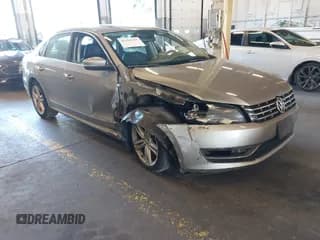 ✅ 2014 Volkswagen Passat SEL Premium • VIN: 1VWCN7A38EC033072 • Lot: 43283495. Listed on IAAI with 130,697 mi. Free auction sales archive from the USA and detailed vehicle history report at DreamBid. Image 1.