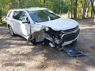 2020 Chevrolet Traverse Premier with VIN 1GNEVKKW7LJ268408, listed as a IAAI auction lot 42147672 with 36,673 mi miles and . Bid and sale history available at DreamBid. Image 1.