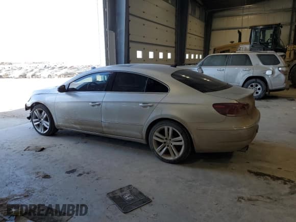 ✅ 2014 Volkswagen CC Executive • VIN: WVWRN7AN6EE524274 • Lot: 88057495. Listed on Copart with 112,058 mi. Free auction sales archive from the USA and detailed vehicle history report at DreamBid. Image 2.