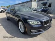✅ 2015 BMW 7 Series 750i xDrive • VIN: WBAYB6C5XFD965910 • Lot: 47488765. Listed on Copart with 173,486 mi. Free auction sales archive from the USA and detailed vehicle history report at DreamBid. Image 4.