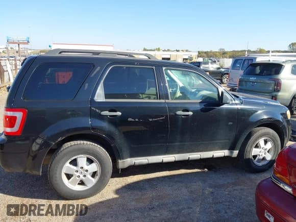 ✅ 2010 Ford Escape XLT • VIN: 1FMCU0DG5AKB50454 • Lot: 43622852. Listed on IAAI with 132,285 mi. Free auction sales archive from the USA and detailed vehicle history report at DreamBid. Image 13.