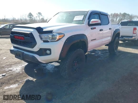 ✅ 2016 Toyota Tacoma SR • VIN: 5TFCZ5AN4GX007514 • Lot: 41737871. Listed on IAAI with 82,135 mi. Free auction sales archive from the USA and detailed vehicle history report at DreamBid. Image 18.