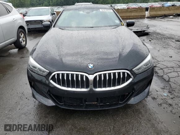 ✅ 2022 BMW 8 Series 840i • VIN: WBAGV4C04NCJ54569 • Лот: 61818223. Опубликован ранее на Copart с пробегом 23 680 миль. Бесплатный доступ к архиву аукционных продаж из США и подробный отчёт об истории автомобиля на DreamBid. Изображение 5.