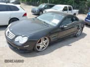 ✅ 2005 Mercedes-Benz SL 55 AMG • VIN: WDBSK74F85F101039 • Lot: 42812397. Listed on IAAI with 76,452 mi. Free auction sales archive from the USA and detailed vehicle history report at DreamBid. Image 2.