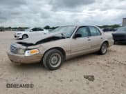 ✅ 1998 Ford Crown Victoria LX • VIN: 2FAFP74W1WX119043 • Lot: 63398405. Listed on Copart with 79,743 mi. Free auction sales archive from the USA and detailed vehicle history report at DreamBid. Image 1.