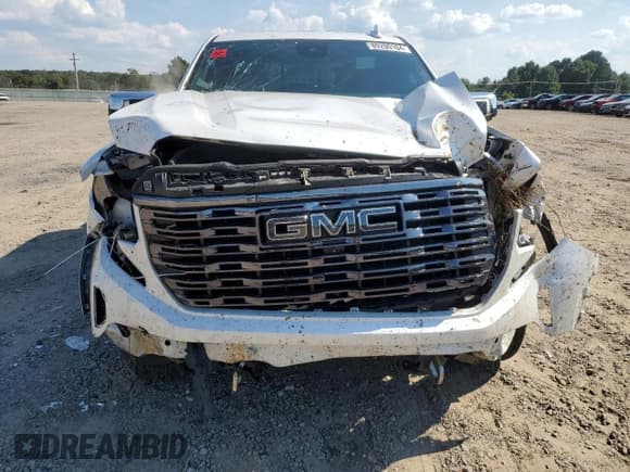 ✅ 2022 GMC Sierra 1500 Denali Ultimate • VIN: 1GTUUHEL6NZ559840 • Lot: 69200104. Wystawiony na Copart z przebiegiem 30 404 mil. Bezpłatny archiwum sprzedaży aukcyjnych z USA i szczegółowy raport historii pojazdu na DreamBid. Zdjęcie 5.