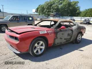2012 Dodge Challenger SXT z VIN 2C3CDYAG2CH269195, wystawiony jako Copart lot #69290284 z przebiegiem Nie podano mil oraz Czysty tytuł • Clean title. Historia ofert i sprzedaży dostępna na DreamBid. Obrazek 1.