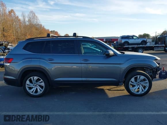 ✅ 2022 Volkswagen Atlas SE • VIN: 1V2KR2CA8NC551702 • Лот: 43642636. Опубликован ранее на IAAI с пробегом 52 057 миль. Бесплатный доступ к архиву аукционных продаж из США и подробный отчёт об истории автомобиля на DreamBid. Изображение 14.