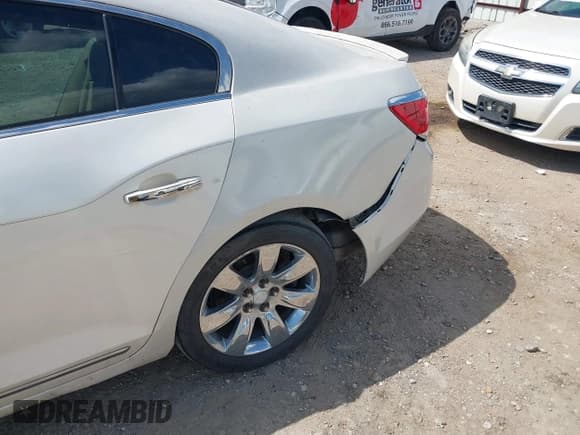 ✅ 2012 Buick LaCrosse Touring • VIN: 1G4GJ5E3XCF271124 • Lot: 43330310. Listed on IAAI with 168,070 mi. Free auction sales archive from the USA and detailed vehicle history report at DreamBid. Image 6.