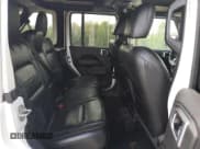 ✅ 2021 Jeep Wrangler Unlimited Sahara Altitude • VIN: 1C4HJXEN0MW741037 • Лот: 71093245. Опубликован ранее на Copart с пробегом 70 607 миль. Бесплатный доступ к архиву аукционных продаж из США и подробный отчёт об истории автомобиля на DreamBid. Изображение 10.