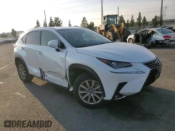 ✅ 2020 Lexus NX 300 • VIN: JTJAARBZ8L2158433 • Лот: 91351065. Опубликован ранее на Copart с пробегом 55 707 миль. Бесплатный доступ к архиву аукционных продаж из США и подробный отчёт об истории автомобиля на DreamBid. Изображение 14.