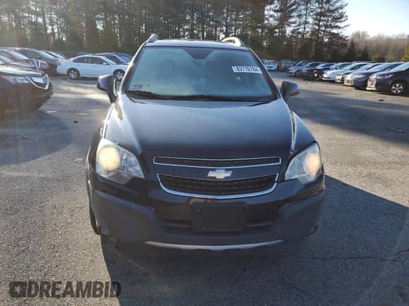 2014 Chevrolet Captiva Sport LS с VIN 3GNAL2EK8ES585273, выставлен на аукционе Copart как лот 83776784 с пробегом 152 851 миль миль и Списание • Salvage title. История ставок и продаж доступна на DreamBid. Изображение 5.