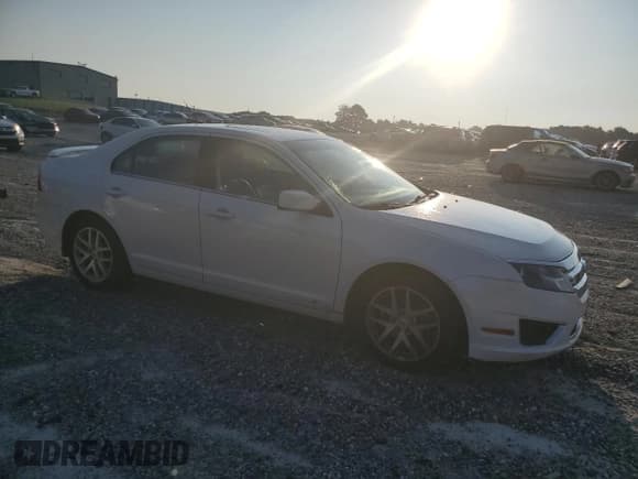 ✅ 2012 Ford Fusion SEL • VIN: 3FAHP0JG5CR450196 • Lot: 69257605. Listed on Copart with 197,027 mi. Free auction sales archive from the USA and detailed vehicle history report at DreamBid. Image 4.