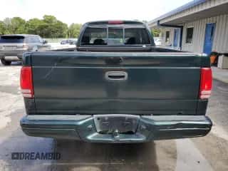 2002 Dodge Dakota z VIN 1B7GG12X32S604952, wystawiony jako Copart lot #70287474 z przebiegiem 261 050 mil mil oraz Nie do naprawy • Non repairable. Historia ofert i sprzedaży dostępna na DreamBid. Obrazek 6.