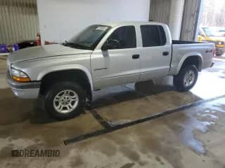 2003 Dodge Dakota Sport z VIN 1D7HG38N03S170907, wystawiony jako Copart lot #46998985 z przebiegiem 97 805 mil mil oraz Szkoda całkowita • Salvage title. Historia ofert i sprzedaży dostępna na DreamBid. Obrazek 1.