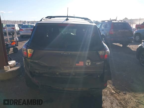 ✅ 2017 Ford Escape Titanium • VIN: 1FMCU9J9XHUB10430 • Lot: 43439885. Listed on IAAI with 148,451 mi. Free auction sales archive from the USA and detailed vehicle history report at DreamBid. Image 17.