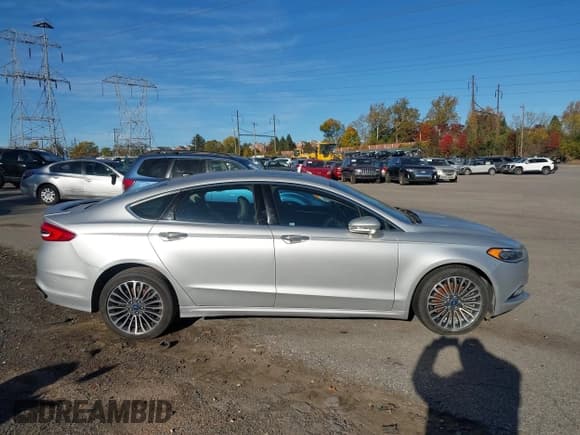 ✅ 2017 Ford Fusion Platinum • VIN: 3FA6P0D93HR225674 • Lot: 43621943. Wystawiony na IAAI z przebiegiem 104 493 mil. Bezpłatny archiwum sprzedaży aukcyjnych z USA i szczegółowy raport historii pojazdu na DreamBid. Zdjęcie 14.