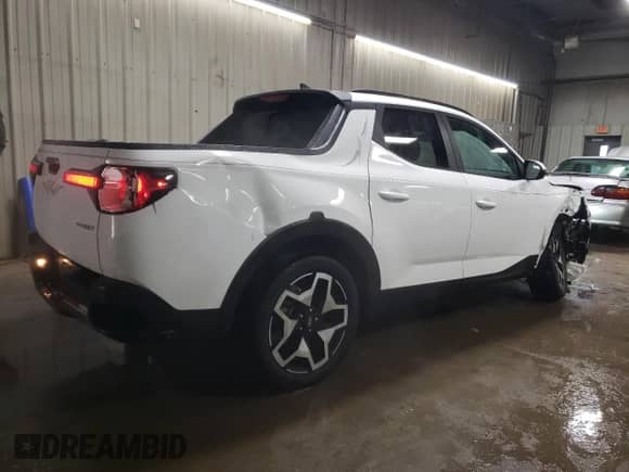 2022 Hyundai Santa Cruz Limited с VIN 5NTJEDAF3NH028869, выставлен на аукционе Copart как лот 88071035 с пробегом 18 304 миль миль и Списание • Salvage title. История ставок и продаж доступна на DreamBid. Изображение 3.