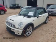 ✅ 2007 MINI Convertible S • VIN: WMWRH33597TL95200 • Lot: 42665233. Listed on IAAI with 76,917 mi. Free auction sales archive from the USA and detailed vehicle history report at DreamBid. Image 2.