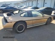 ✅ 1987 Pontiac Fiero GT • VIN: 1G2PG119XHP200243 • Lot: 74389864. Wystawiony na Copart z przebiegiem 109 478 mil. Bezpłatny archiwum sprzedaży aukcyjnych z USA i szczegółowy raport historii pojazdu na DreamBid. Zdjęcie 3.