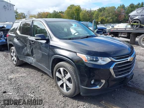 2020 Chevrolet Traverse LT z VIN 1GNEVHKW3LJ106407, wystawiony jako IAAI lot #43463464 z przebiegiem 103 973 mil mil oraz . Historia ofert i sprzedaży dostępna na DreamBid. Obrazek 6.