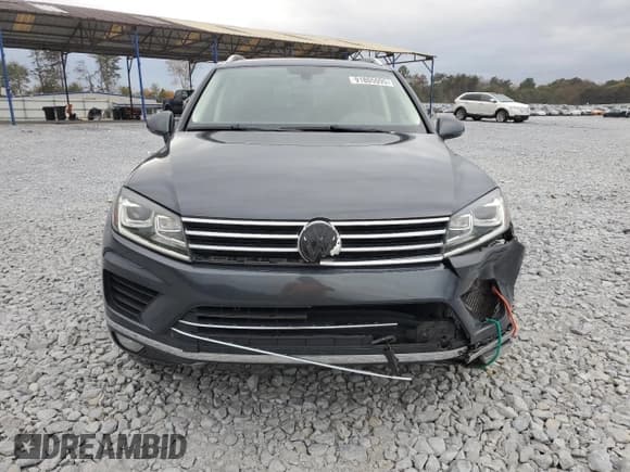 ✅ 2015 Volkswagen Touareg Sport • VIN: WVGEP9BPXFD007812 • Лот: 91805095. Опубликован ранее на Copart с пробегом 149 009 миль. Бесплатный доступ к архиву аукционных продаж из США и подробный отчёт об истории автомобиля на DreamBid. Изображение 5.