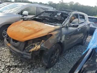 2013 Hyundai Santa Fe 2.4L с VIN 5XYZU3LB90G123435, выставлен на аукционе Copart как лот 65957025 с пробегом Не указан миль и Списание • Salvage title. История ставок и продаж доступна на DreamBid. Изображение 1.