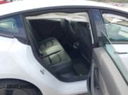 ✅ 2021 Tesla Model 3 Standard Range Plus • VIN: 5YJ3E1EA5MF086418 • Lot: 41252902. Wystawiony na IAAI z przebiegiem 7 858 mil. Bezpłatny archiwum sprzedaży aukcyjnych z USA i szczegółowy raport historii pojazdu na DreamBid. Zdjęcie 8.