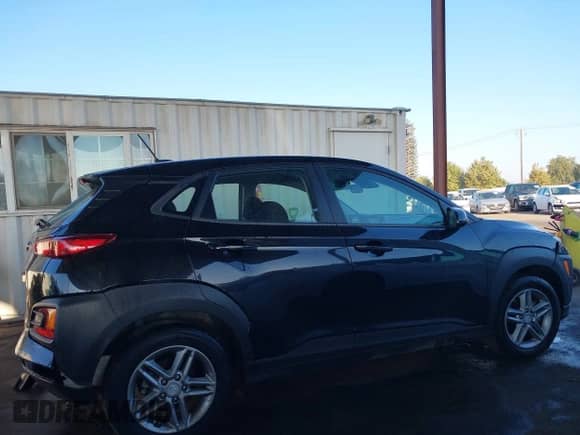 2020 Hyundai Kona SE with VIN KM8K12AA7LU438984, listed as a IAAI auction lot 43461187 with 91,120 mi miles and . Bid and sale history available at DreamBid. Image 13.