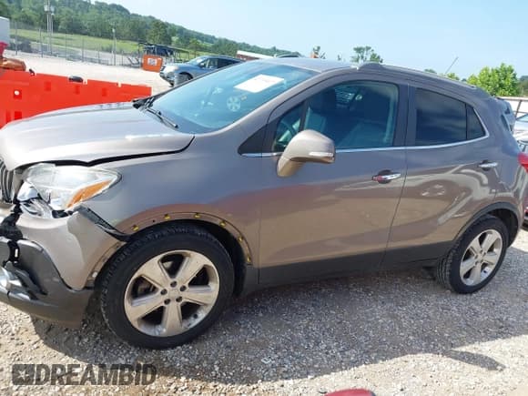 ✅ 2015 Buick Encore Leather • VIN: KL4CJCSB4FB121633 • Lot: 42739417. Listed on IAAI with 80,998 mi. Free auction sales archive from the USA and detailed vehicle history report at DreamBid. Image 14.