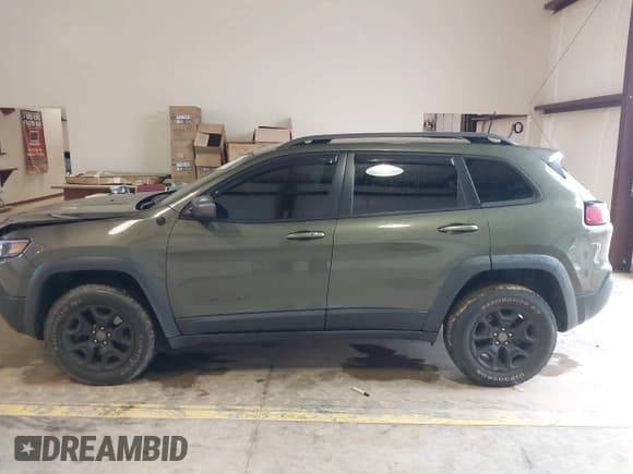 ✅ 2020 Jeep Cherokee Trailhawk Elite • VIN: 1C4PJMBN2LD538076 • Lot: 42219282. Listed on IAAI with 53,773 mi. Free auction sales archive from the USA and detailed vehicle history report at DreamBid. Image 14.