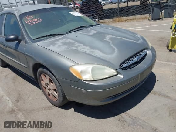 ✅ 2001 Ford Taurus LX • VIN: 1FAFP52U61A187636 • Lot: 42477322. Wystawiony na IAAI z przebiegiem 118 467 mil. Bezpłatny archiwum sprzedaży aukcyjnych z USA i szczegółowy raport historii pojazdu na DreamBid. Zdjęcie 6.