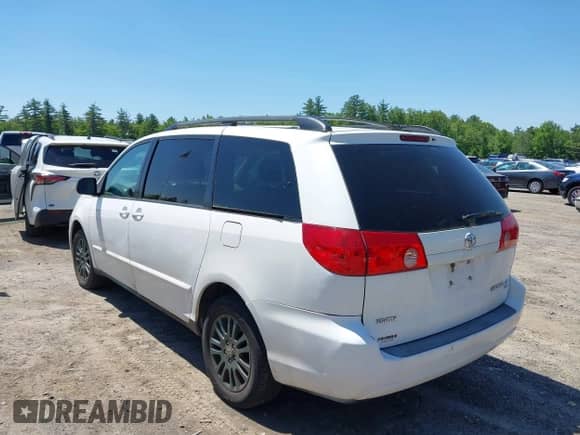 2009 Toyota Sienna LE with VIN 5TDBK23C09S024815, listed as a IAAI auction lot 42414365 with 254,522 mi miles and . Bid and sale history available at DreamBid. Image 3.