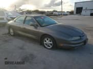 ✅ 1999 Oldsmobile Aurora • VIN: 1G3GR62C8X4116452 • Lot: 84070784. Listed on Copart with 92,526 mi. Free auction sales archive from the USA and detailed vehicle history report at DreamBid. Image 4.