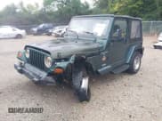 ✅ 2000 Jeep Wrangler Sahara • VIN: 1J4FA59S5YP700649 • Лот: 43291151. Опубликован ранее на IAAI с пробегом 183 974 миль. Бесплатный доступ к архиву аукционных продаж из США и подробный отчёт об истории автомобиля на DreamBid. Изображение 2.