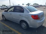 ✅ 2011 Kia Rio LX • VIN: KNADH4A33B6955270 • Лот: 43517512. Опубликован ранее на IAAI с пробегом 138 650 миль. Бесплатный доступ к архиву аукционных продаж из США и подробный отчёт об истории автомобиля на DreamBid. Изображение 3.