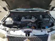 ✅ 2007 Suzuki Grand Vitara • VIN: JS3TE941874200165 • Lot: 44692545. Listed on Copart with 115,283 mi. Free auction sales archive from the USA and detailed vehicle history report at DreamBid. Image 12.