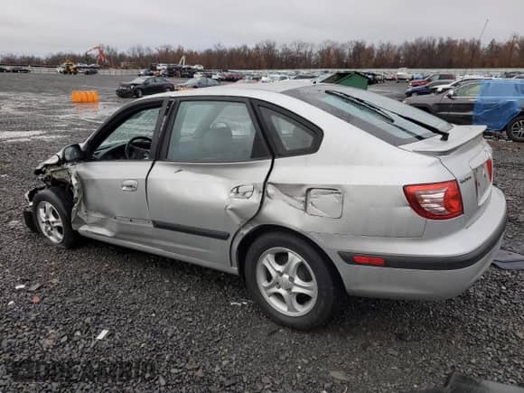 2005 Hyundai Elantra GLS z VIN KMHDN56D85U144983, wystawiony jako Copart lot #81267754 z przebiegiem 163 920 mil mil oraz Szkoda całkowita • Salvage title. Historia ofert i sprzedaży dostępna na DreamBid. Obrazek 2.