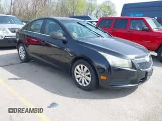 2011 Chevrolet Cruze LS z VIN 1G1PC5SH6B7220784, wystawiony jako IAAI lot #41925405 z przebiegiem 143 685 mil mil oraz . Historia ofert i sprzedaży dostępna na DreamBid. Obrazek 1.