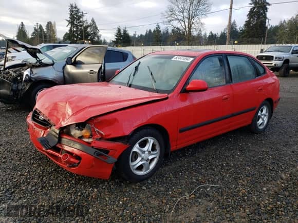 2004 Hyundai Elantra GT z VIN KMHDN56D34U104583, wystawiony jako Copart lot #82441094 z przebiegiem Nie podano mil oraz Szkoda całkowita • Salvage title. Historia ofert i sprzedaży dostępna na DreamBid. Obrazek 1.
